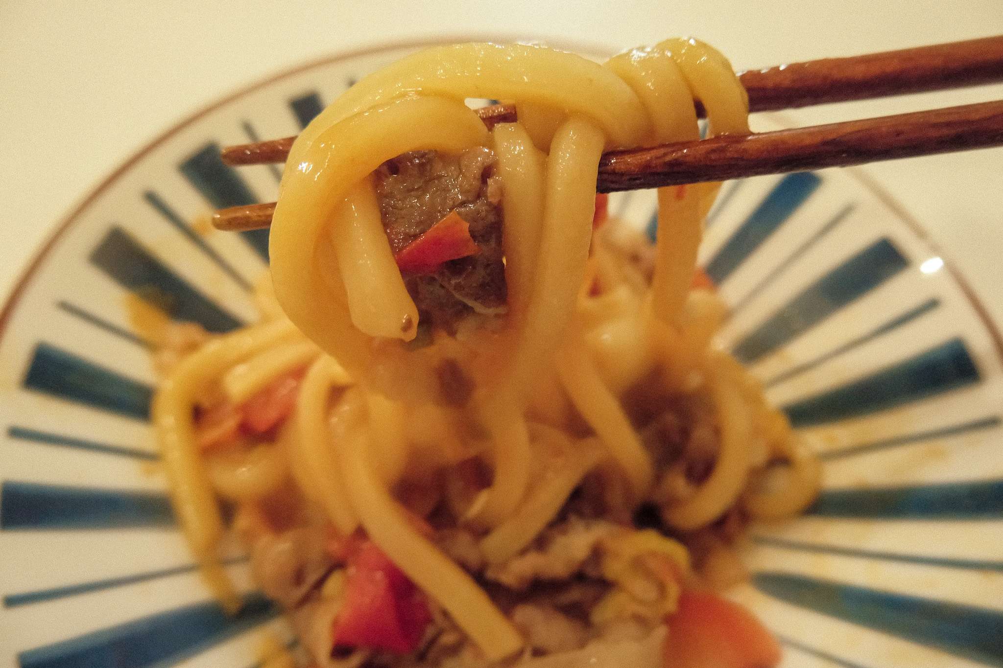 yaki udon with chopsticks