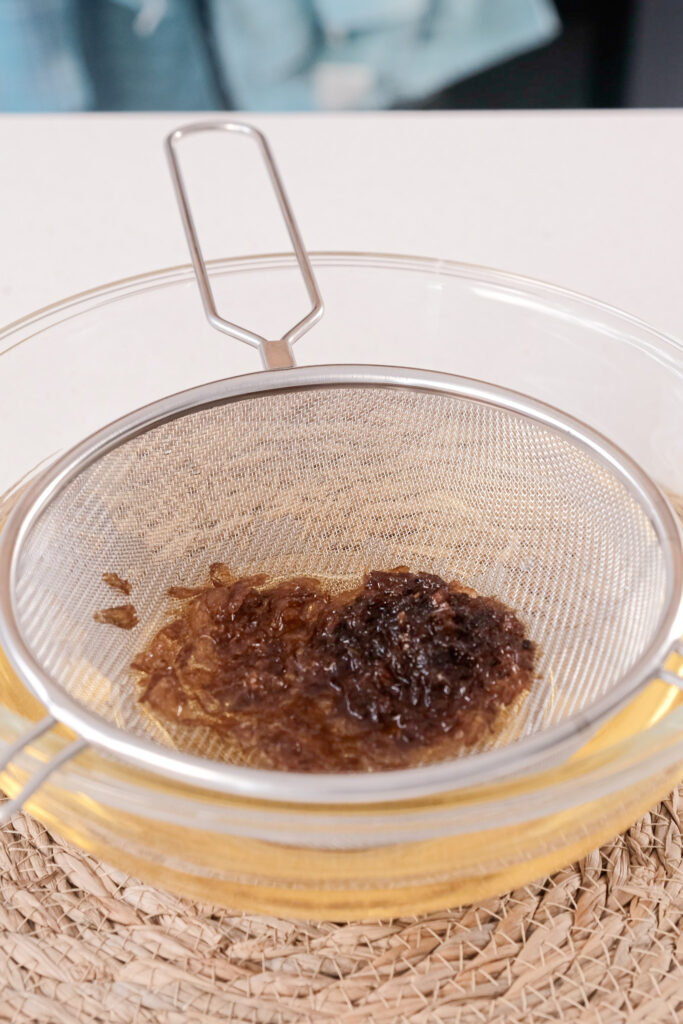 straining the oil