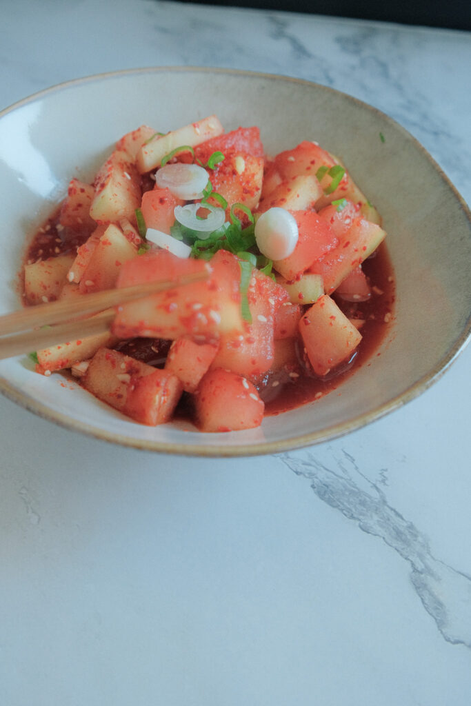 watermelon kimchi with chopsticks