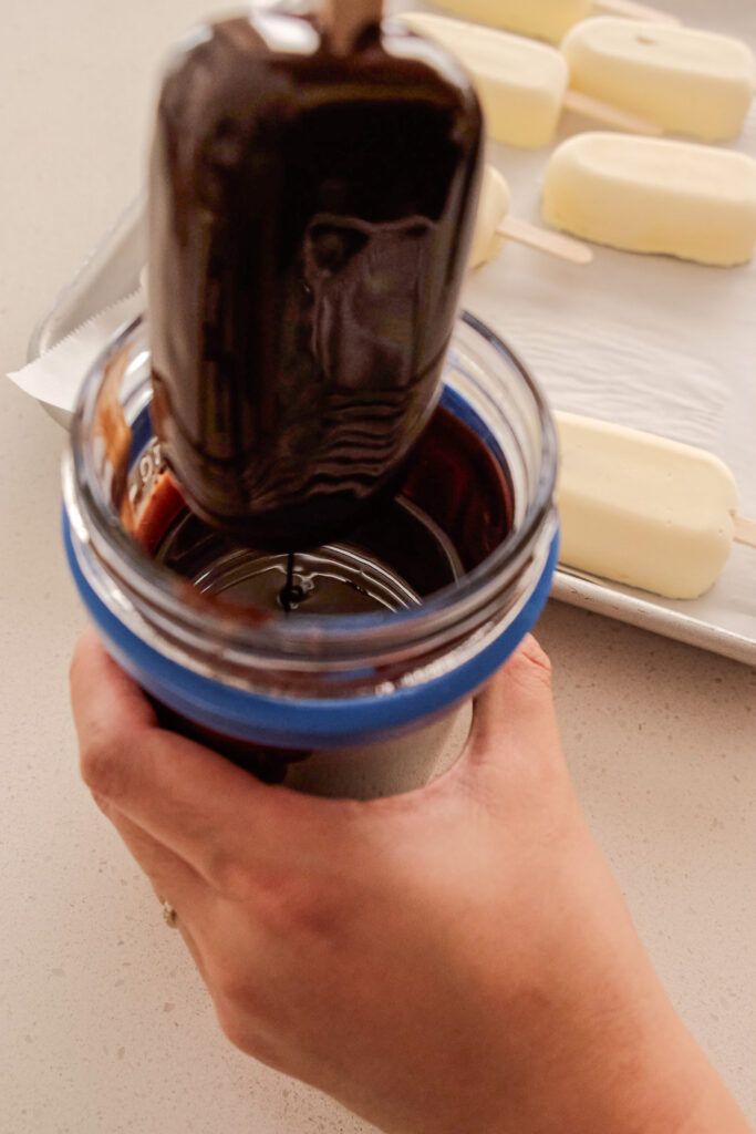 Dipping the mango ice cream bars