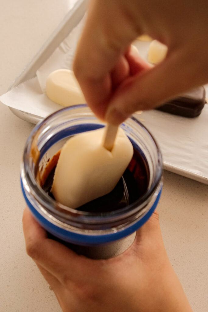 Dipping the mango ice cream bars