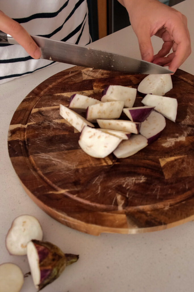 Cutting eggplant into bite size pieces