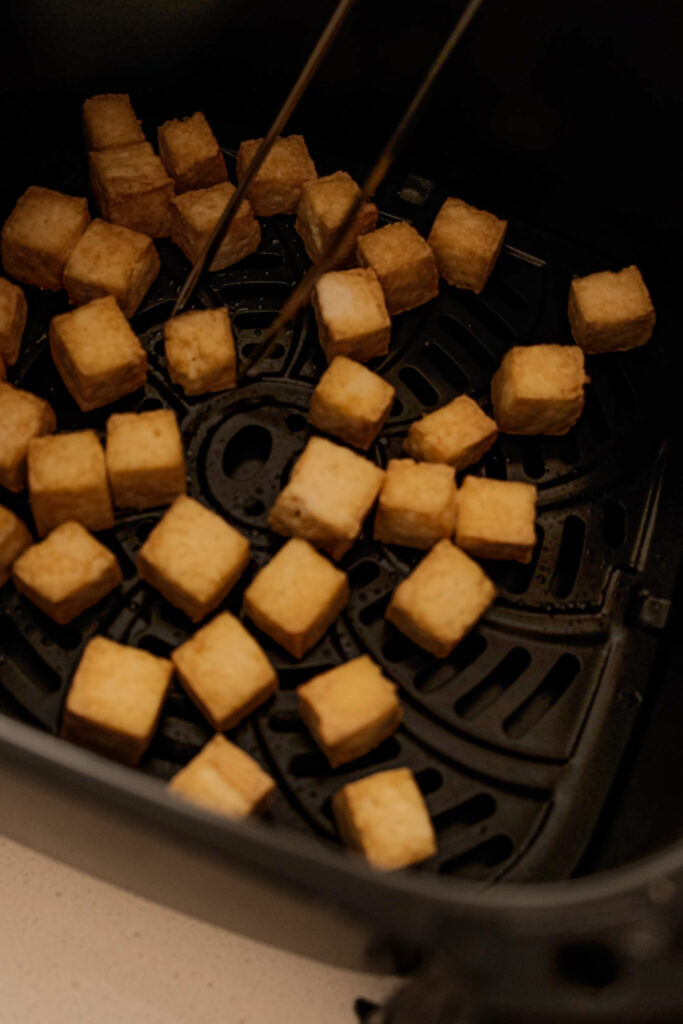 Flipping tofu in the air fryer