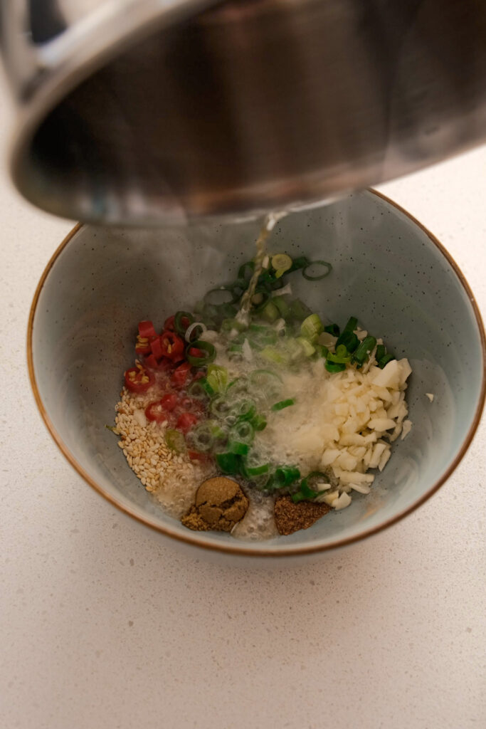 Hot oil onto aromatics