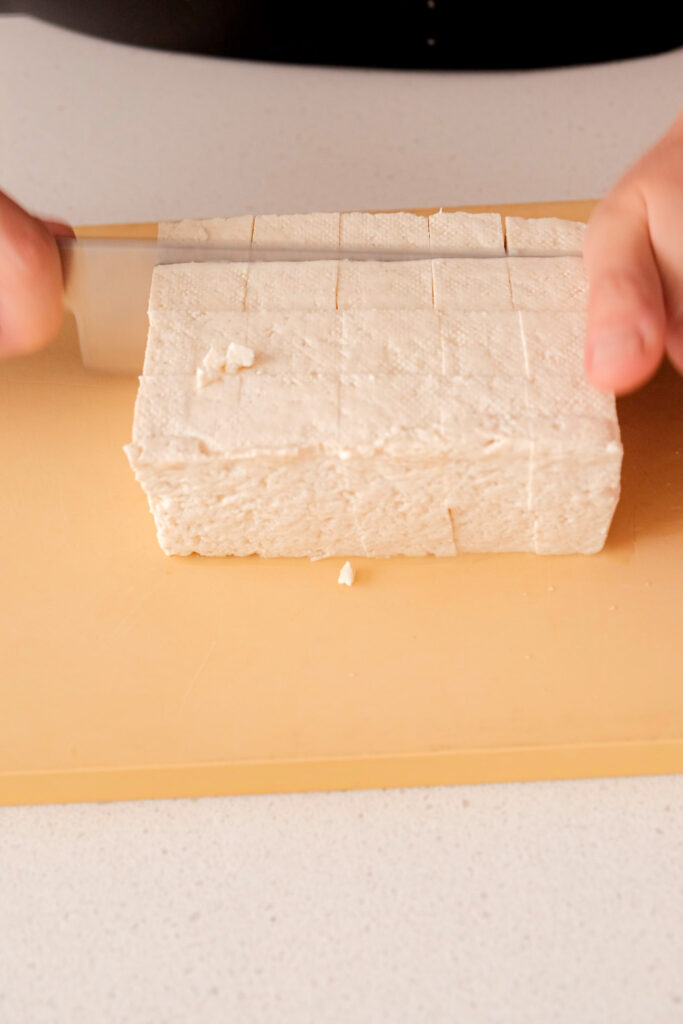 Cutting tofu into cubes