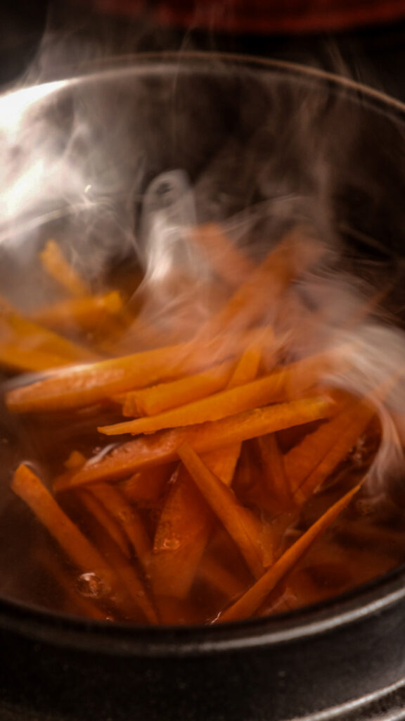 Adding carrots in soup