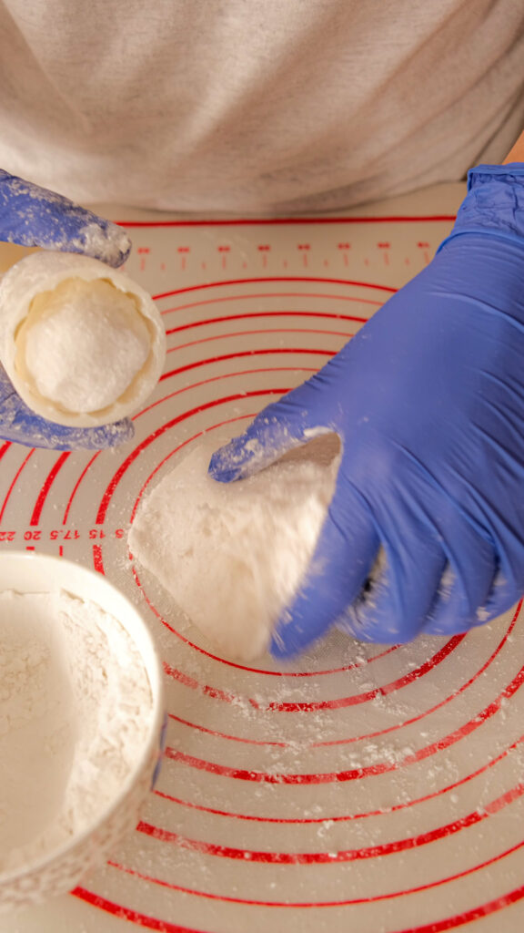Putting mooncake into mold