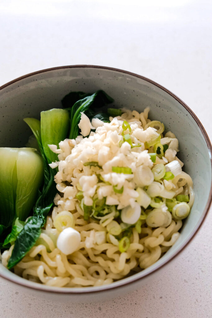 Scallions and ginger on noodles