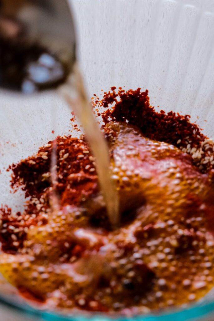 Putting more oil into chili flakes