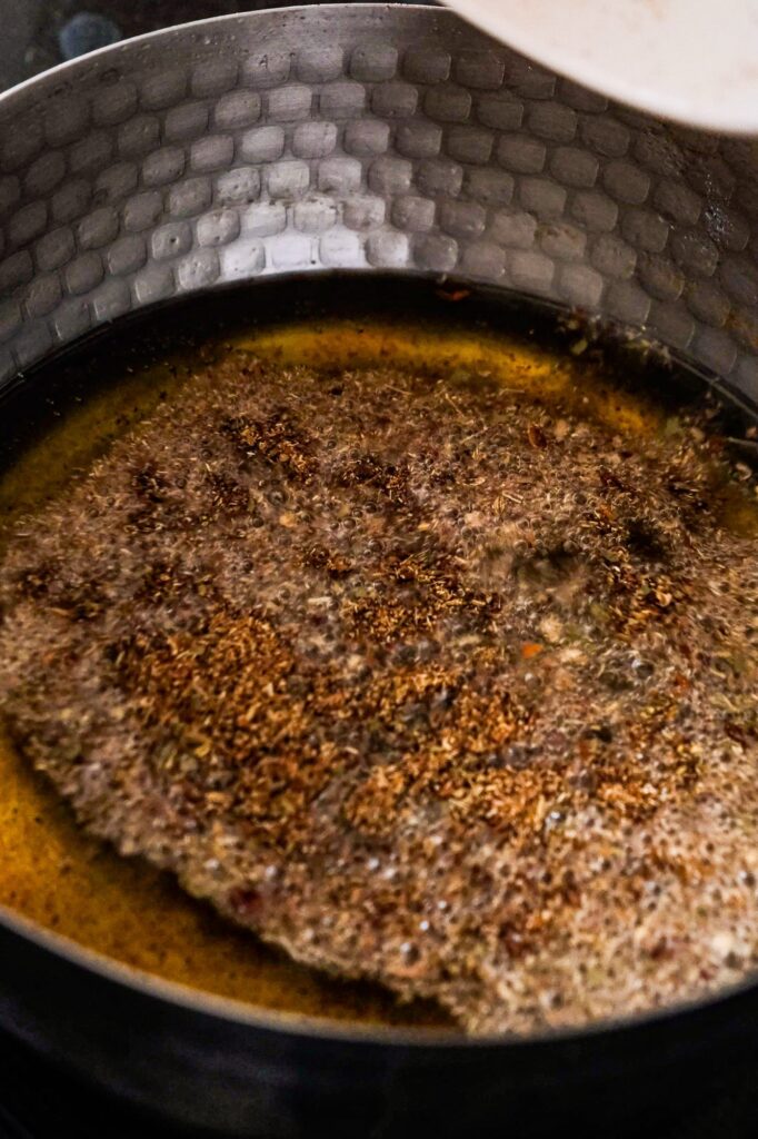 Adding spices to oil