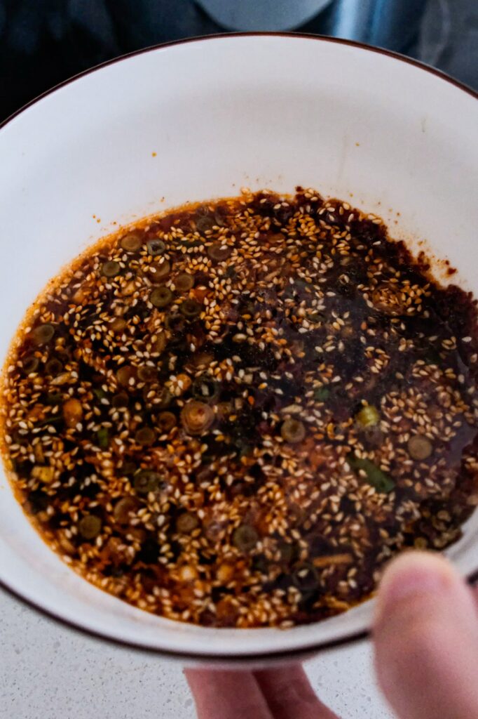 Adding soup to sauce