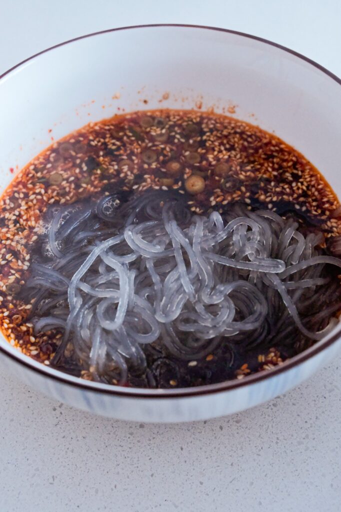 Adding potato noodles to the soup
