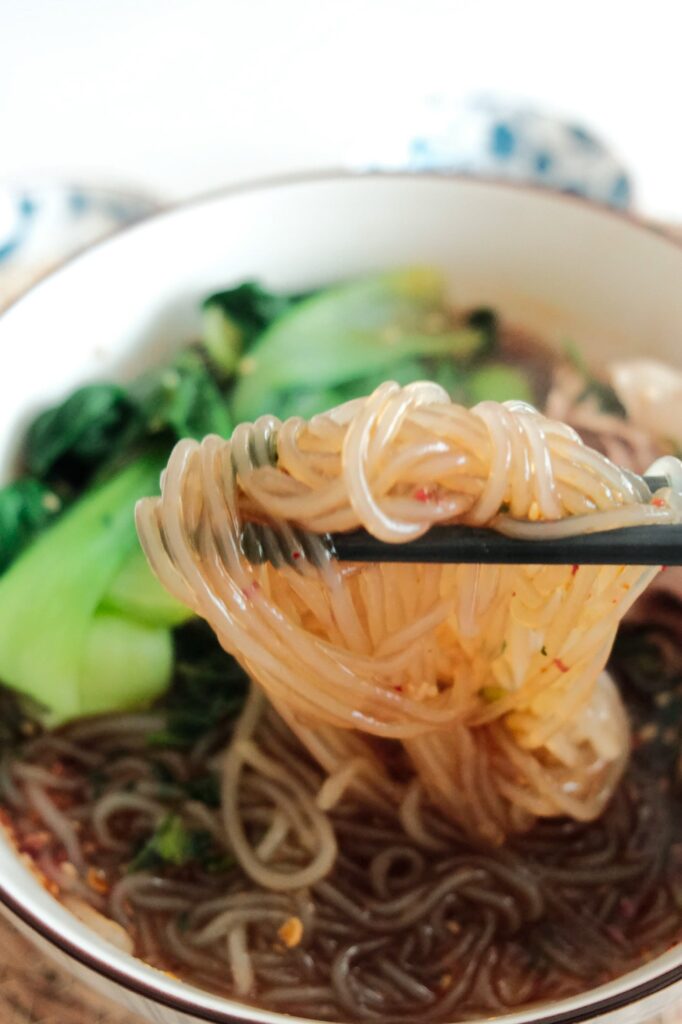 potato noodles on chopsticks