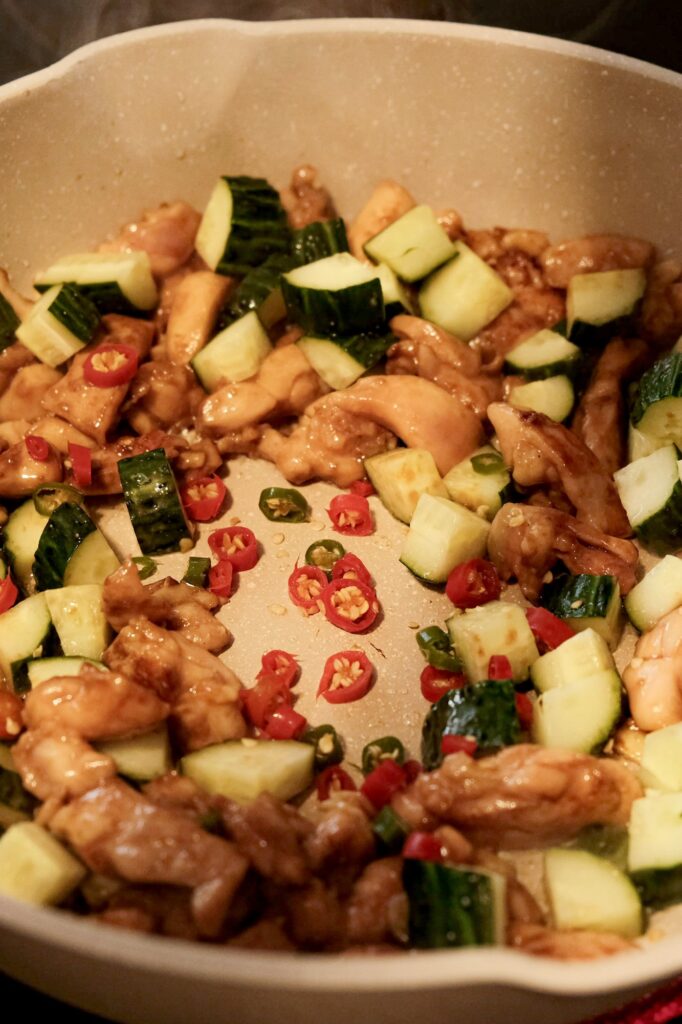 adding chili and cucumber